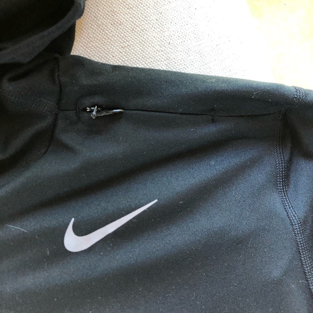 A Nike pull over with hood zippers and thumb holes - Picture 6 of 6